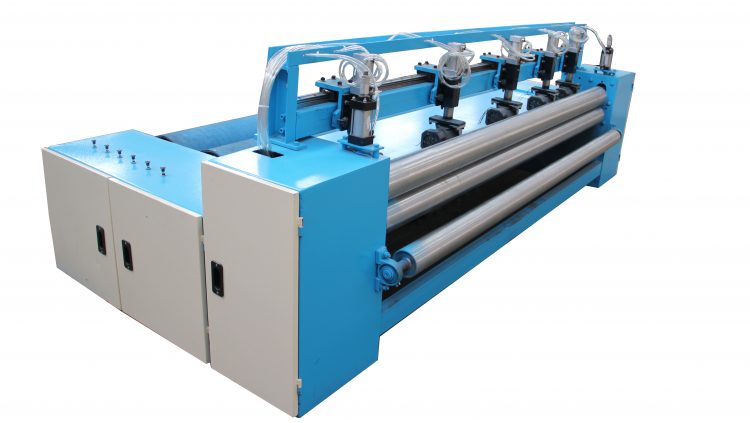 CUTTING AND WINDING MACHINE